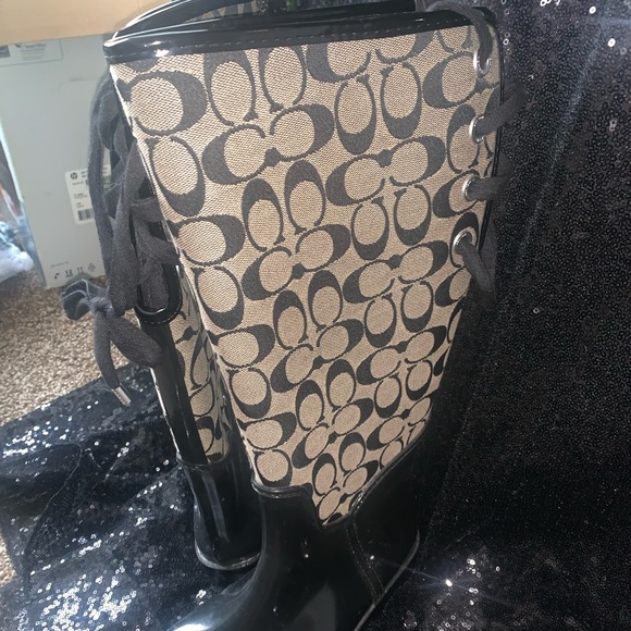 Coach rain boots with lace up ties in back. Super cute and only worn twice. - Picture 2 of 6